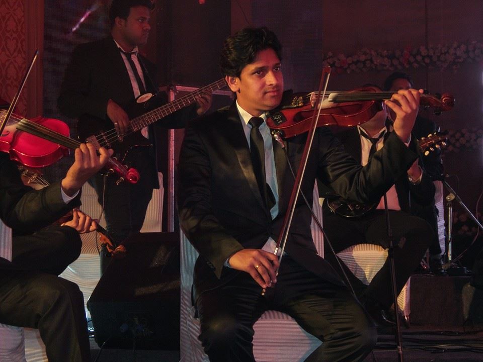male violin players ramallah palestine